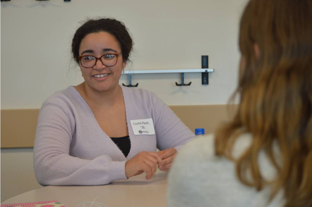 Caylie Peet talking with students at the 30 Minute Mentors Event